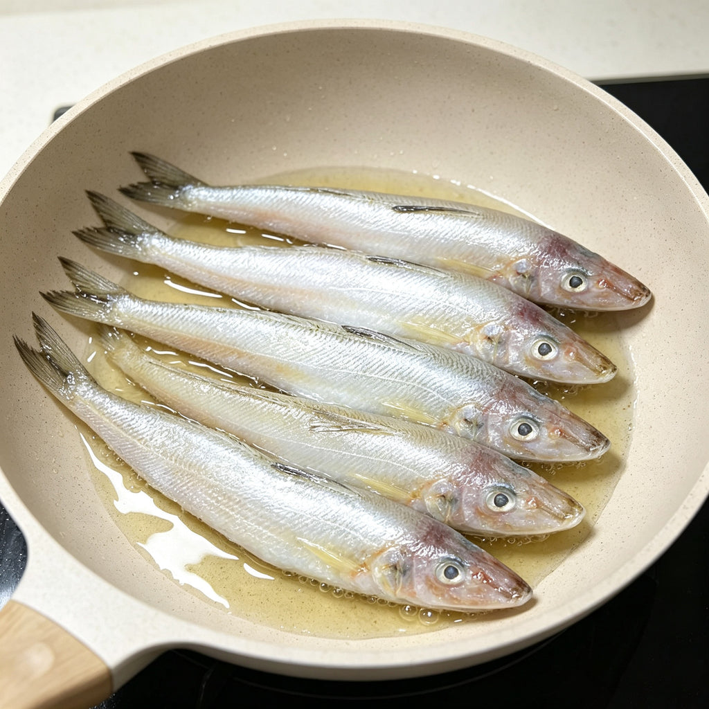 Slender sillago laid out in a white pan ready to cook